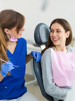woman visiting Anthem dentist smiling in chair